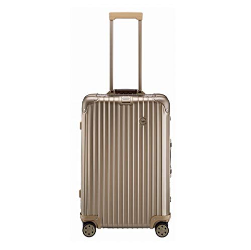 The Best Luxury Suitcases Worth Splurging On—Rimowa, Prada, Ghurka