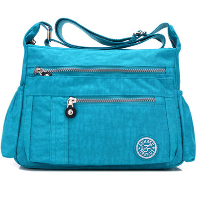 suojapuku Crossbody Bags for Women,blue sea and white houses,Travel Bag  Purses and Handbags Shoulder Bag Messenger Bag
